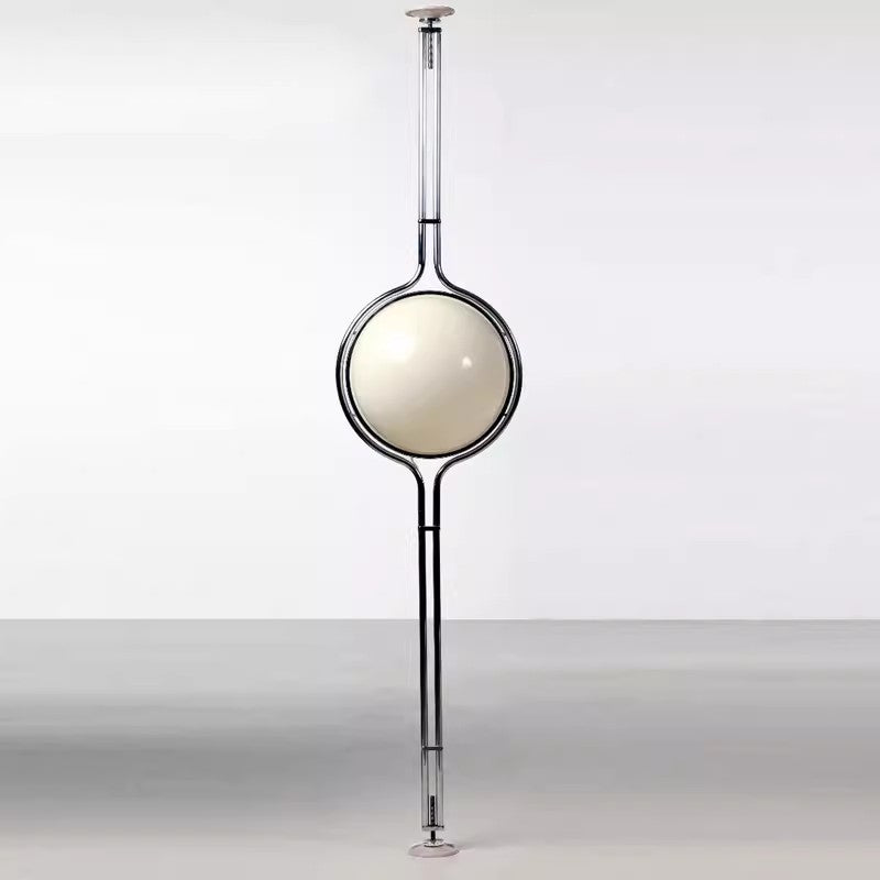 A chrome Globe Floor to Ceiling Lamp with a seamless steel frame and a globe-shaped light fixture, set against a neutral background.