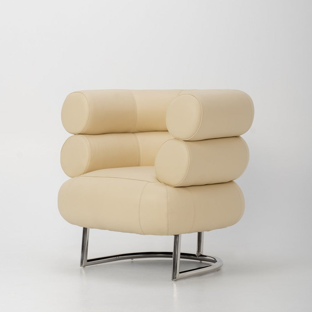 Bibendum Chair in Bone Italian Leather - Replica. Side view of chair showing the two stacked leather rolls on the soft, plump base that sits on a stainless steel legs